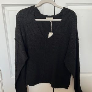 Never worn large black sweater.